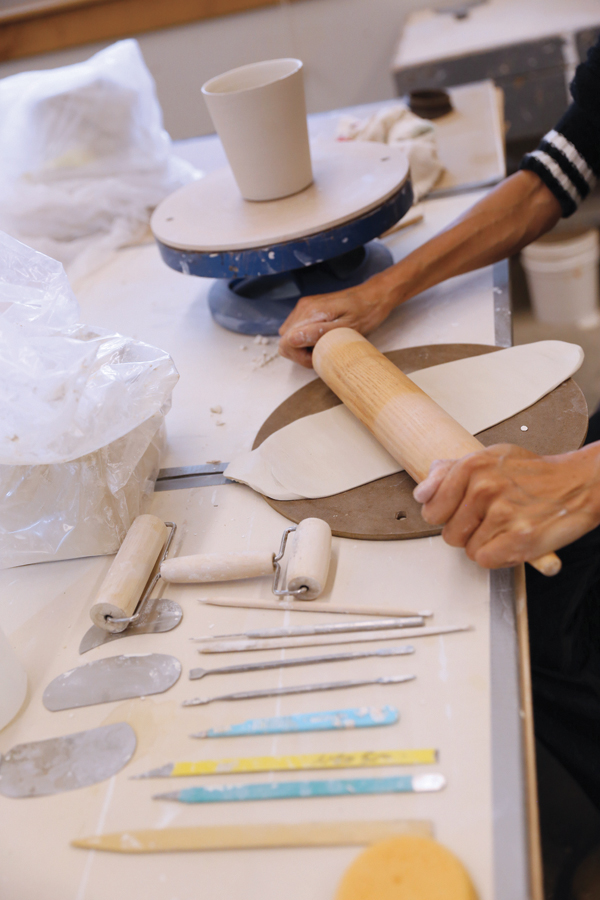 1 After throwing the cup form, roll out a thin slab for the surface decoration.