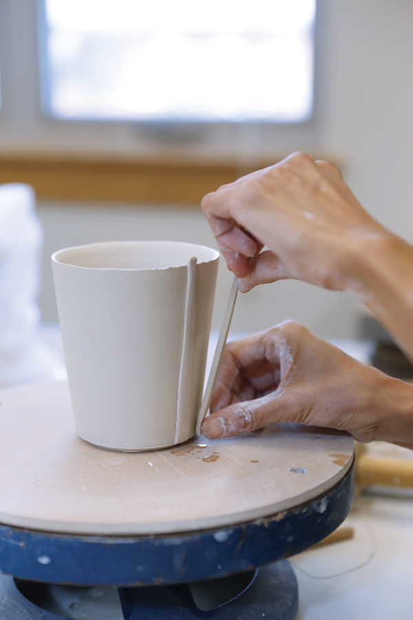 3 If the cup is freshly thrown, attach the strips to it without slipping and scoring.
