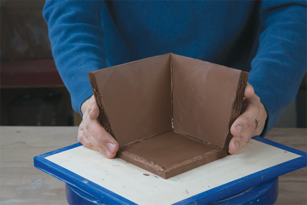 3. Cut out the parts of the box, score the edges and begin to assemble the box.