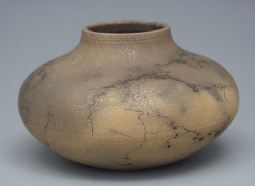 Fig 6. Finished pot with horsehair decoration.