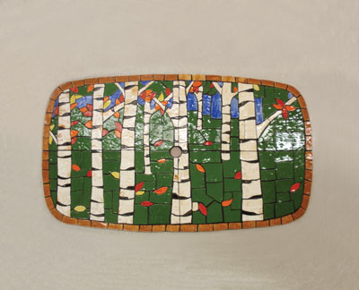 The completed mosaic ready to be placed onto the table frame.