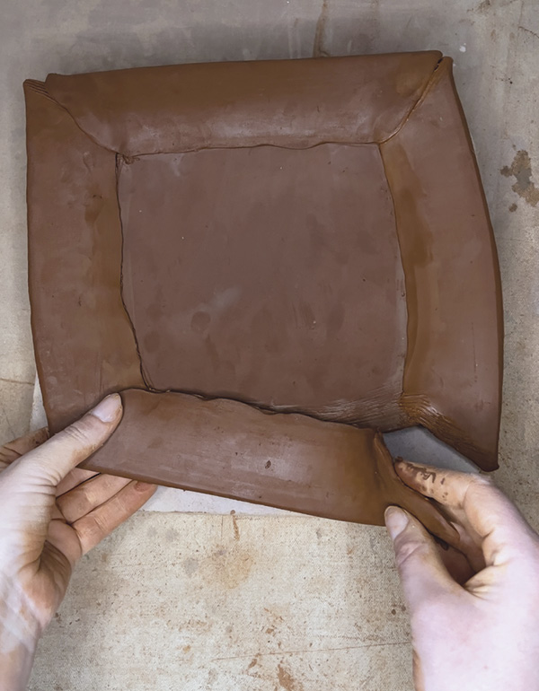 14 Slip, score, and overlap each corner to ensure a good attachment.