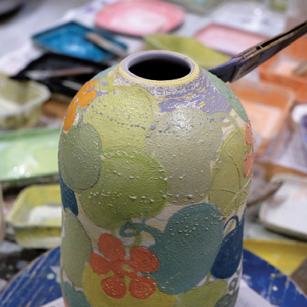 11 Paint the darker color on top of the yellow, leaving streaks where the underpainting shows through.