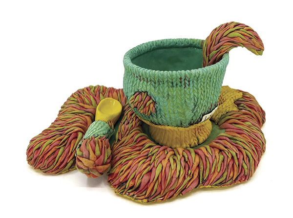 Lindsay Langsdale's Hairy Teacup, Spoon and Saucer set, 12 in. (30.5 cm) in length, tinted porcelain, glaze, Mason stain washes, 2024.