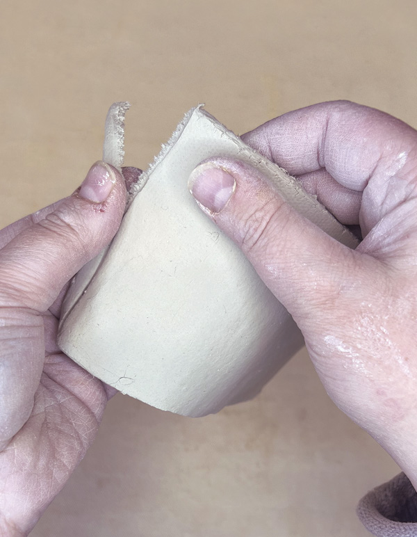 4 Score the slab’s short end. Tear along the scored line to create a deckled edge.