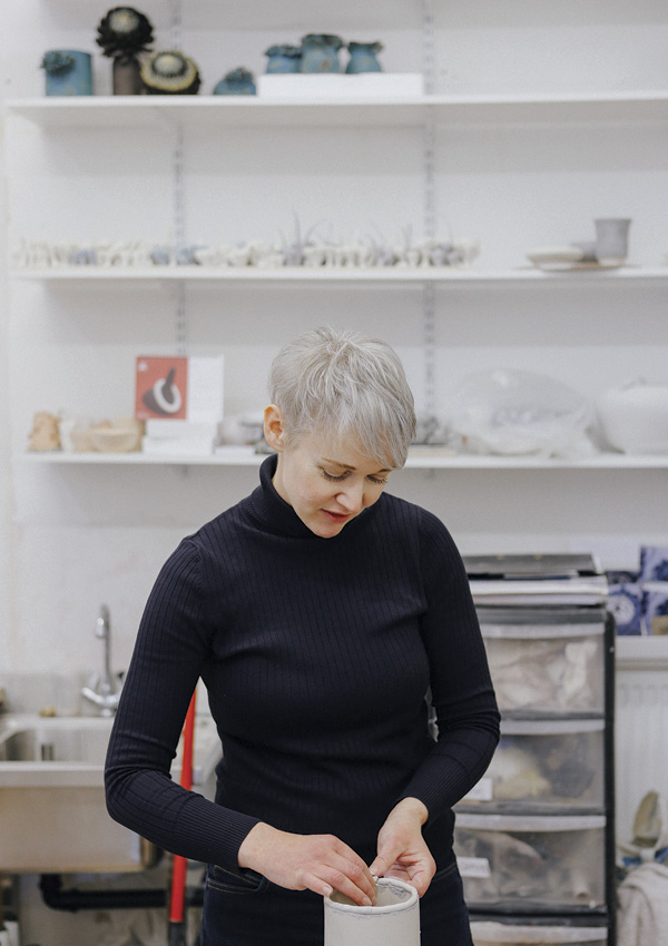 Linda Southwell in her studio working with some porcelain, 2020. Photo: Joe Horner.