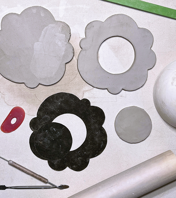 2 Break the puff plate into sections: the bottom slab, the top slab (minus the center), and the center circle.