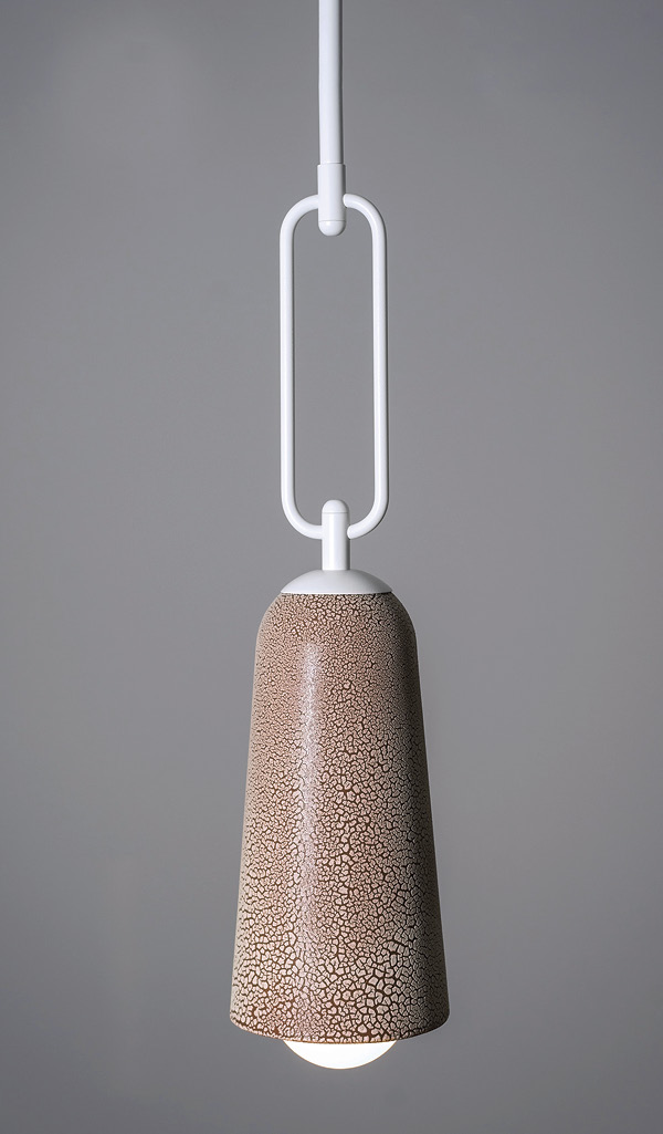 1 Pax Lighting's The Bancroft Pendant in textured ivory brass and ivory lichen glazed terra cotta.