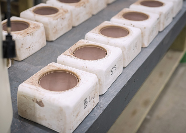 6 A batch of 4¾-inch (12.1-cm) diameter reflectors sitting in their molds to dry.