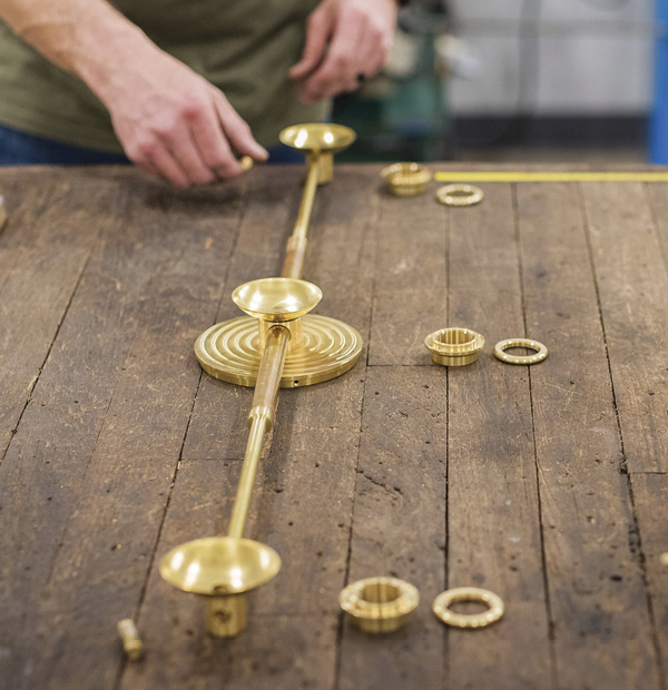 7 Assembly of the Dixon Triple Sconce in brass before it is hand finished.