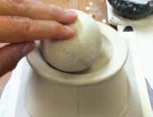10 Flip both over. Roll a ball around to de-fine the rim and create a concave shape.