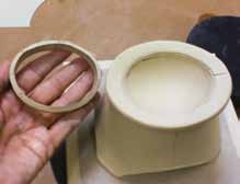 12 When the flange has stiffened, score the flange and the inside of the lid.