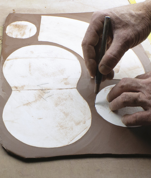2 Place the templates on the slab and cut out two sets of each shape. Allow the slabs to firm up.