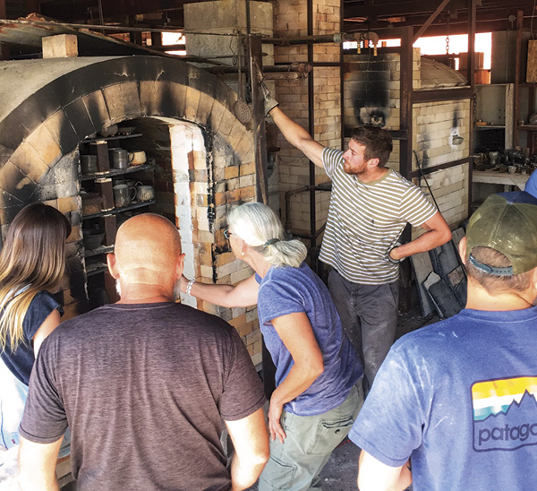 Workshop attendees look on as Tip Toland demonstrates. Archie Bray Foundation, Helena, Montana.