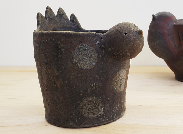 Megan Thomas' Wood-fired bowl, 4½ in. (11.4 cm) in height, thrown-and-altered iron-rich stoneware, Cedar Heights Redart and laterite washes, fired in a wood kiln to cone 10, reduction cooled, 2024.