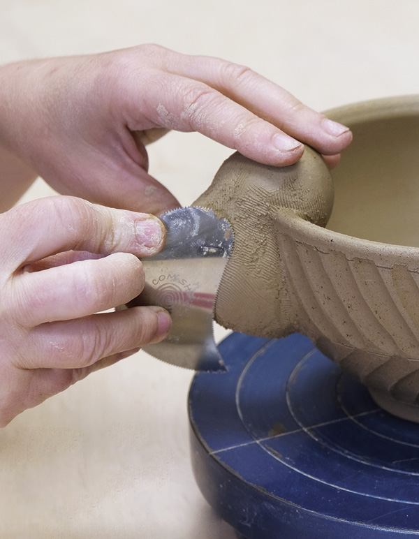8 Use a curved serrated rib to erase seams then clean up the form.