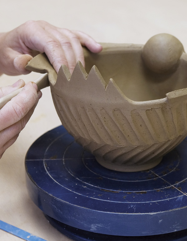 12 Compress the point where the wing curves around and attaches to the bowl.